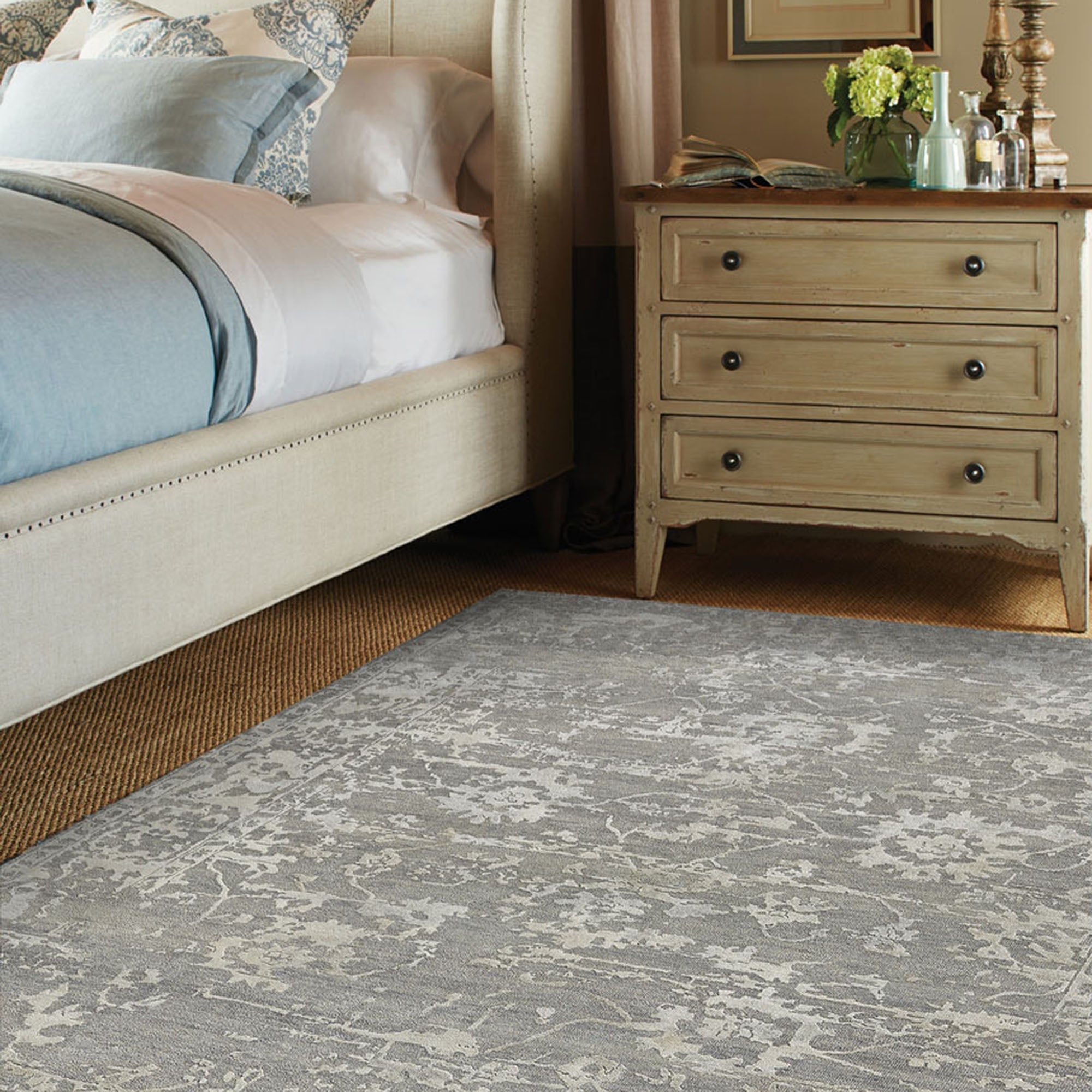 grey rug in bedroom