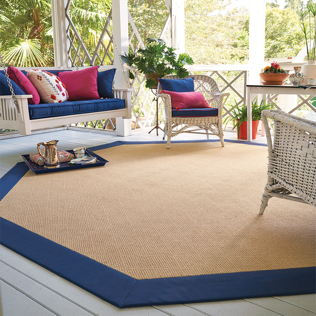 bordered rug on porch