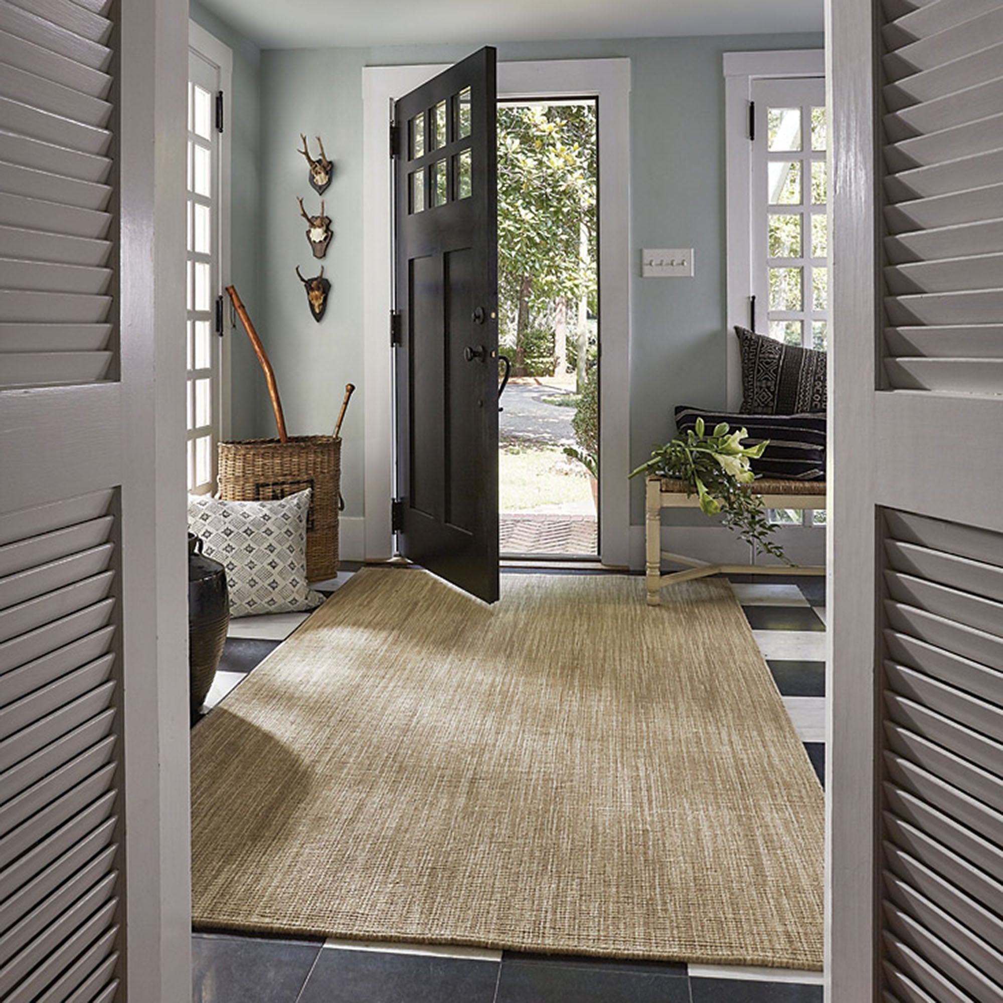 loomed rug in entryway