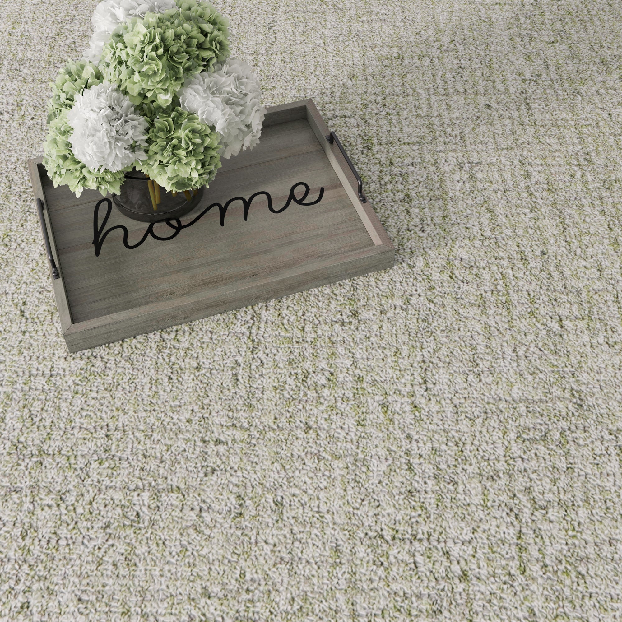 green rug with flowers 